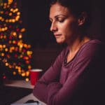woman appears sad during holidays