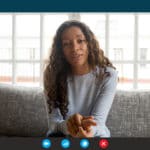 woman provides therapy through online video chat